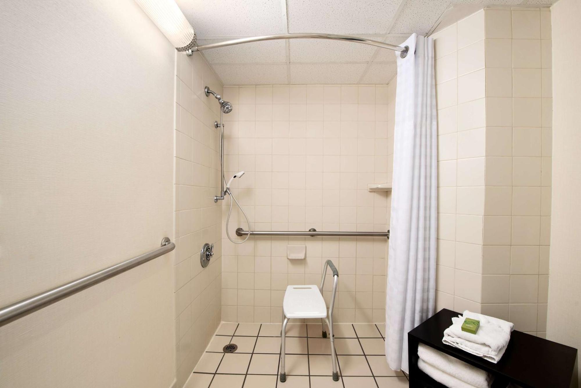 One-Bedroom Suite Two Double Beds Roll Shower Mobility Access or Non-Smoking