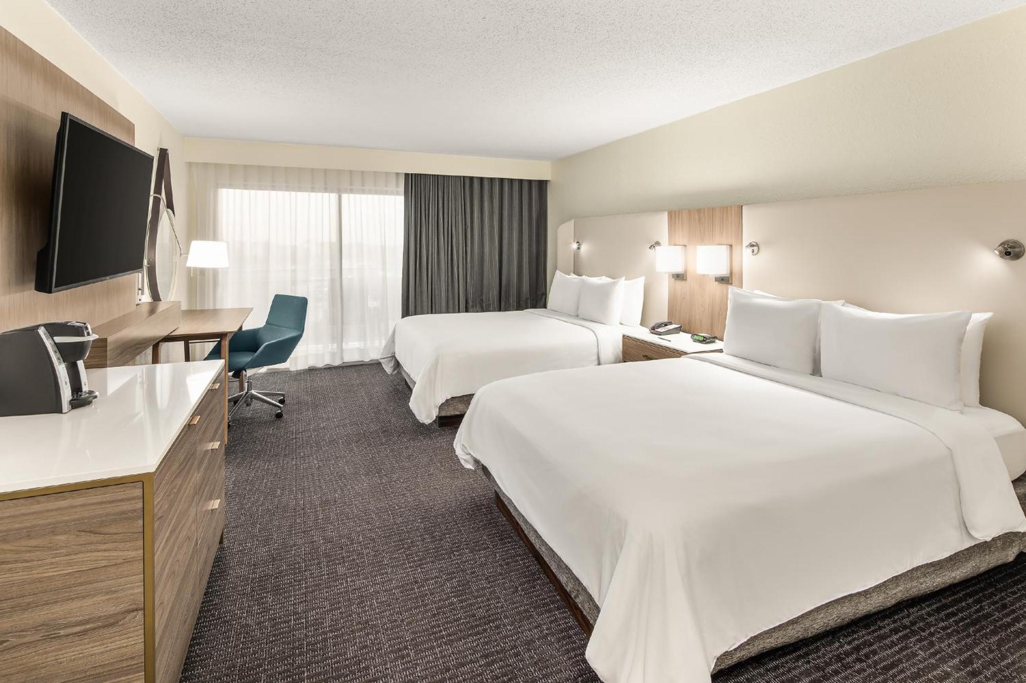 Standard Queen Room with Two Queen Beds and Mobility Accessible Roll-In Shower