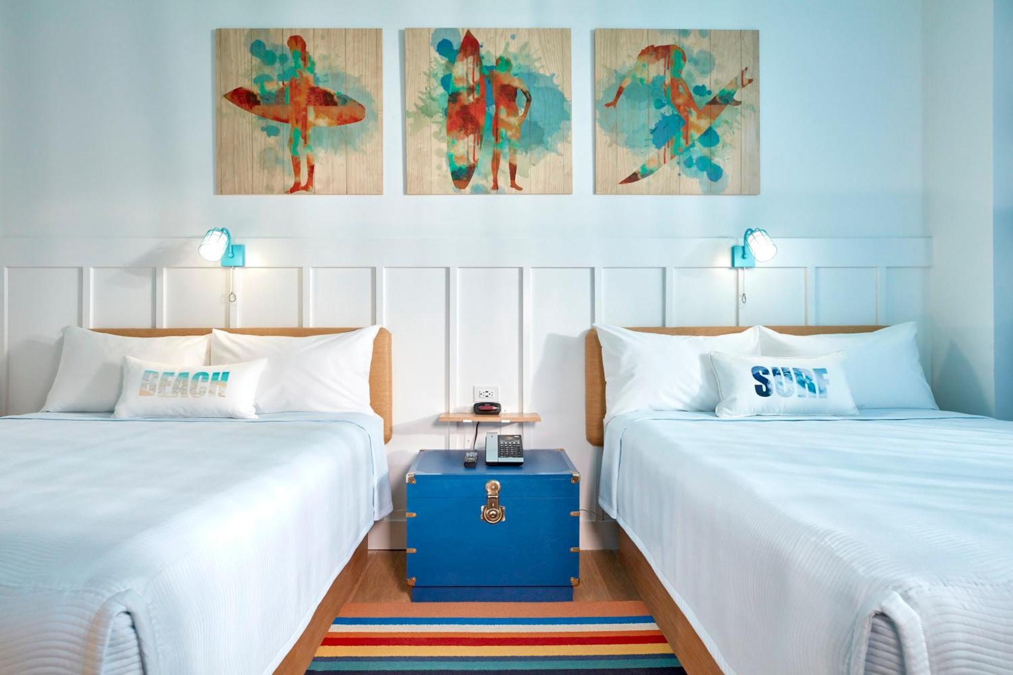 Queen Room Two Queen Beds Pool View Includes Early Park Admission*