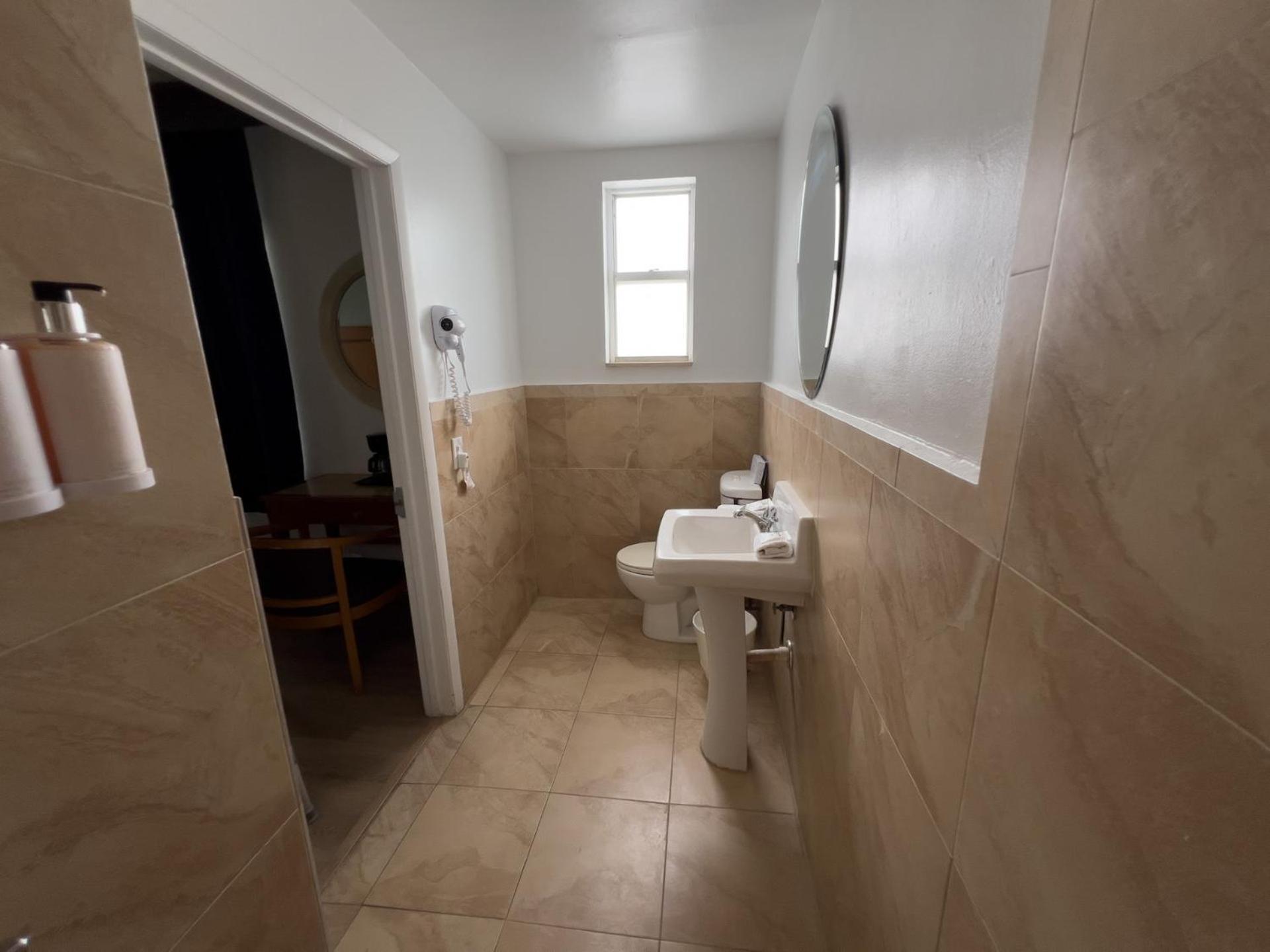 King Room Roll Shower Mobility Access or Non-Smoking