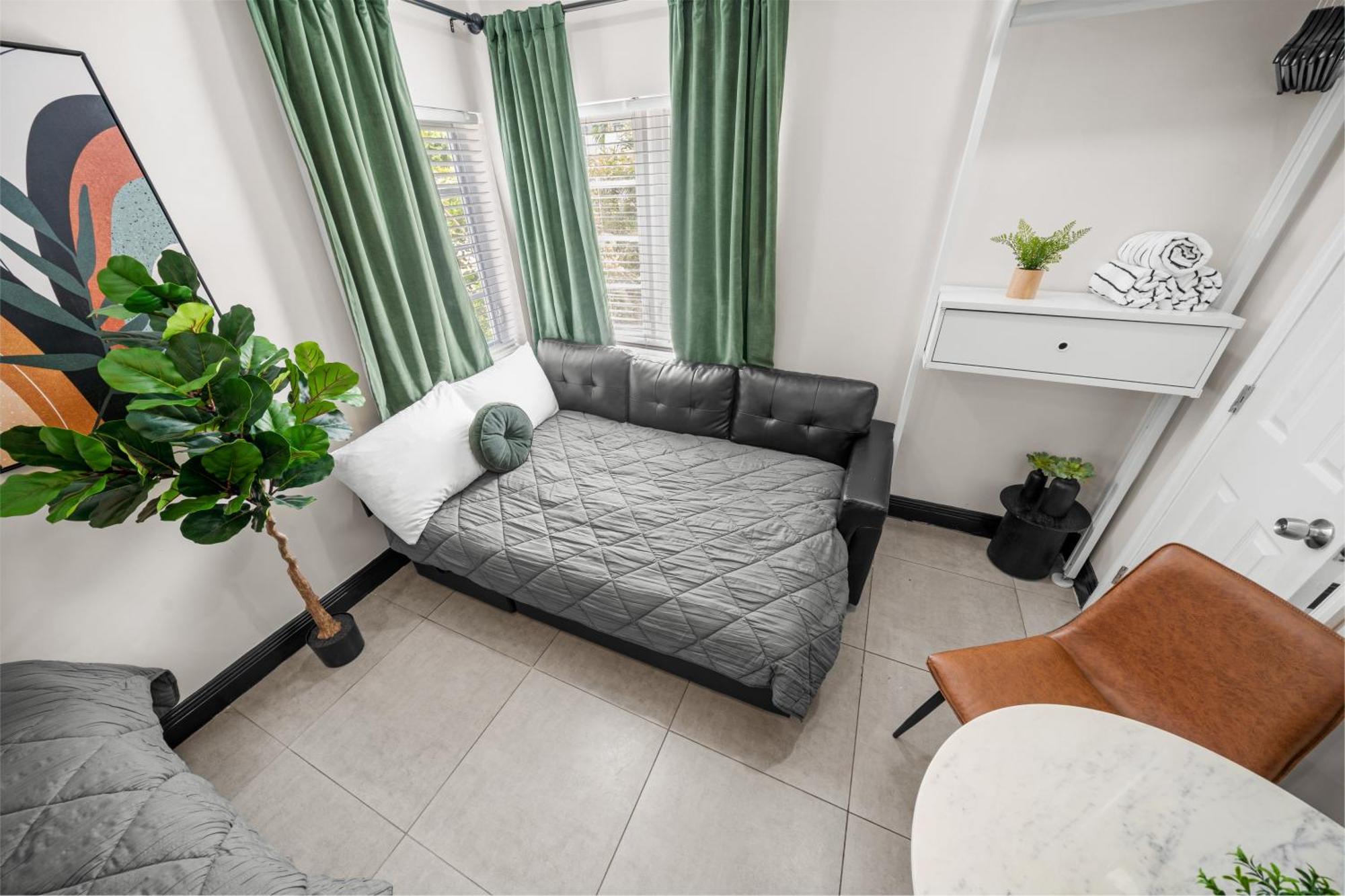 Deluxe Corner Queen Studio with Kitchenette and Sofa Bed