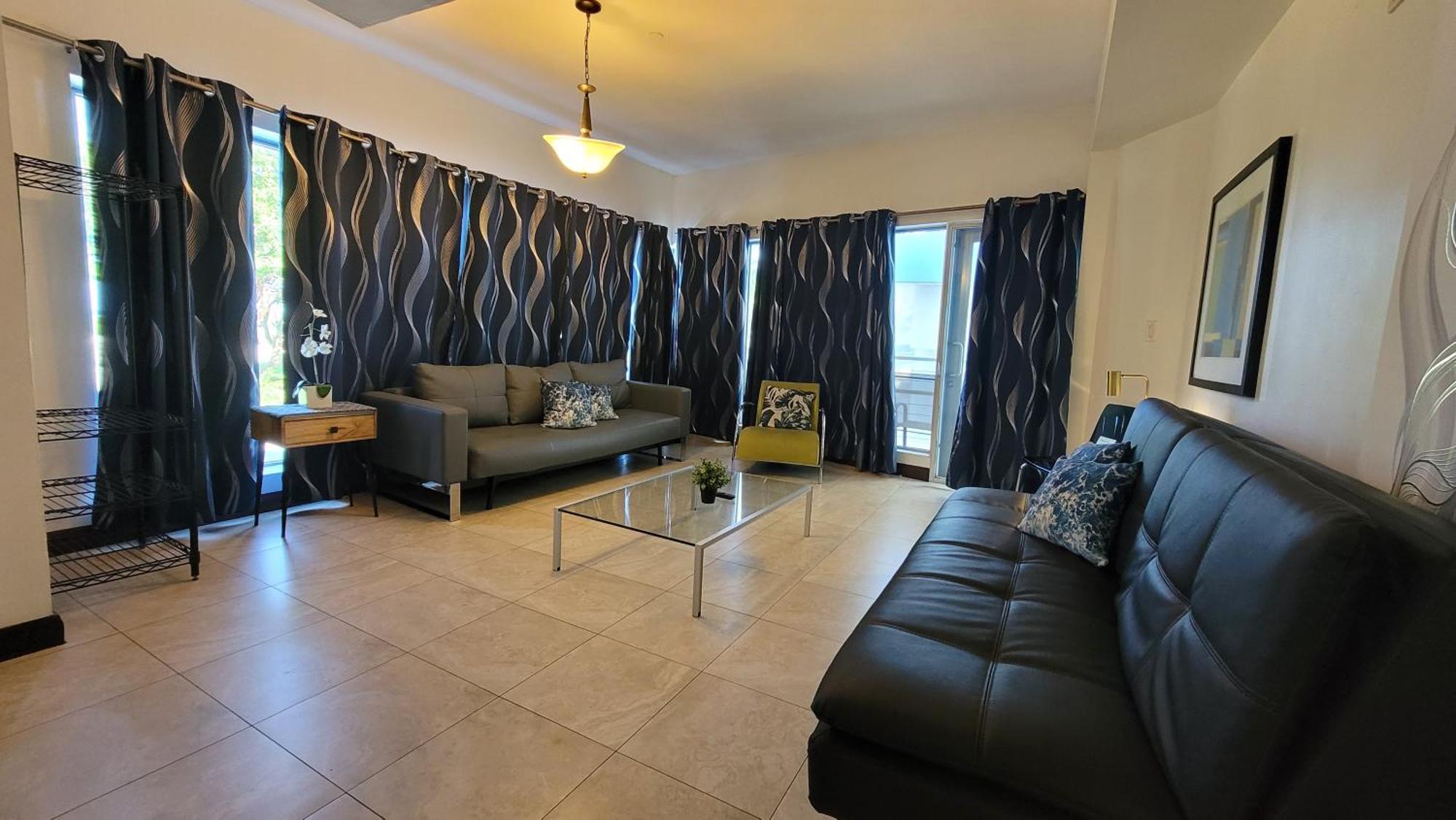 One-Bedroom King Suite Partial Ocean View Balcony Unit C302