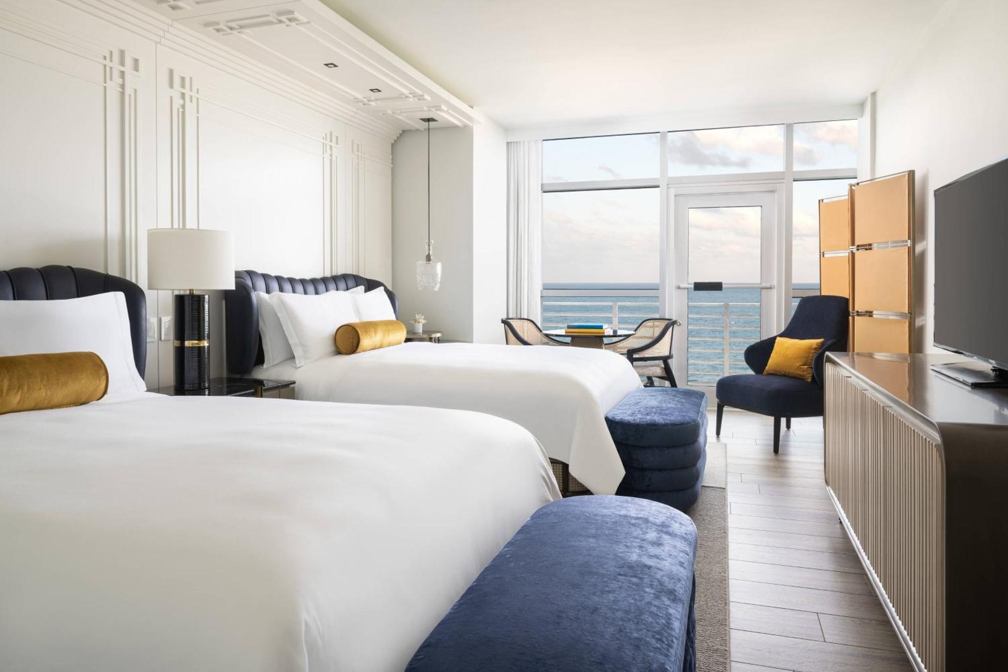 Zimmer mit Meerblick und 2 Doppelbetten