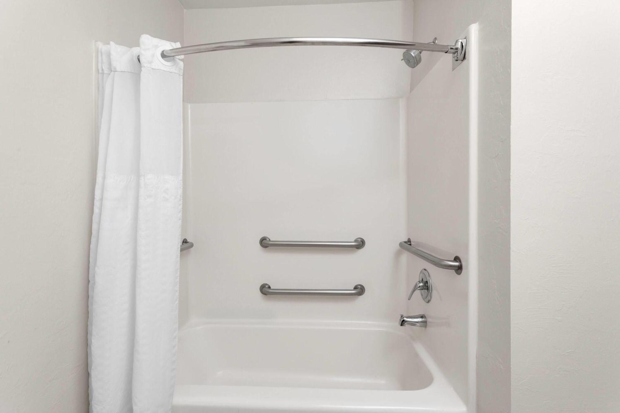 King Room One King Bed Bathtub Grab Bars Pool View Accessible Non-Smoking