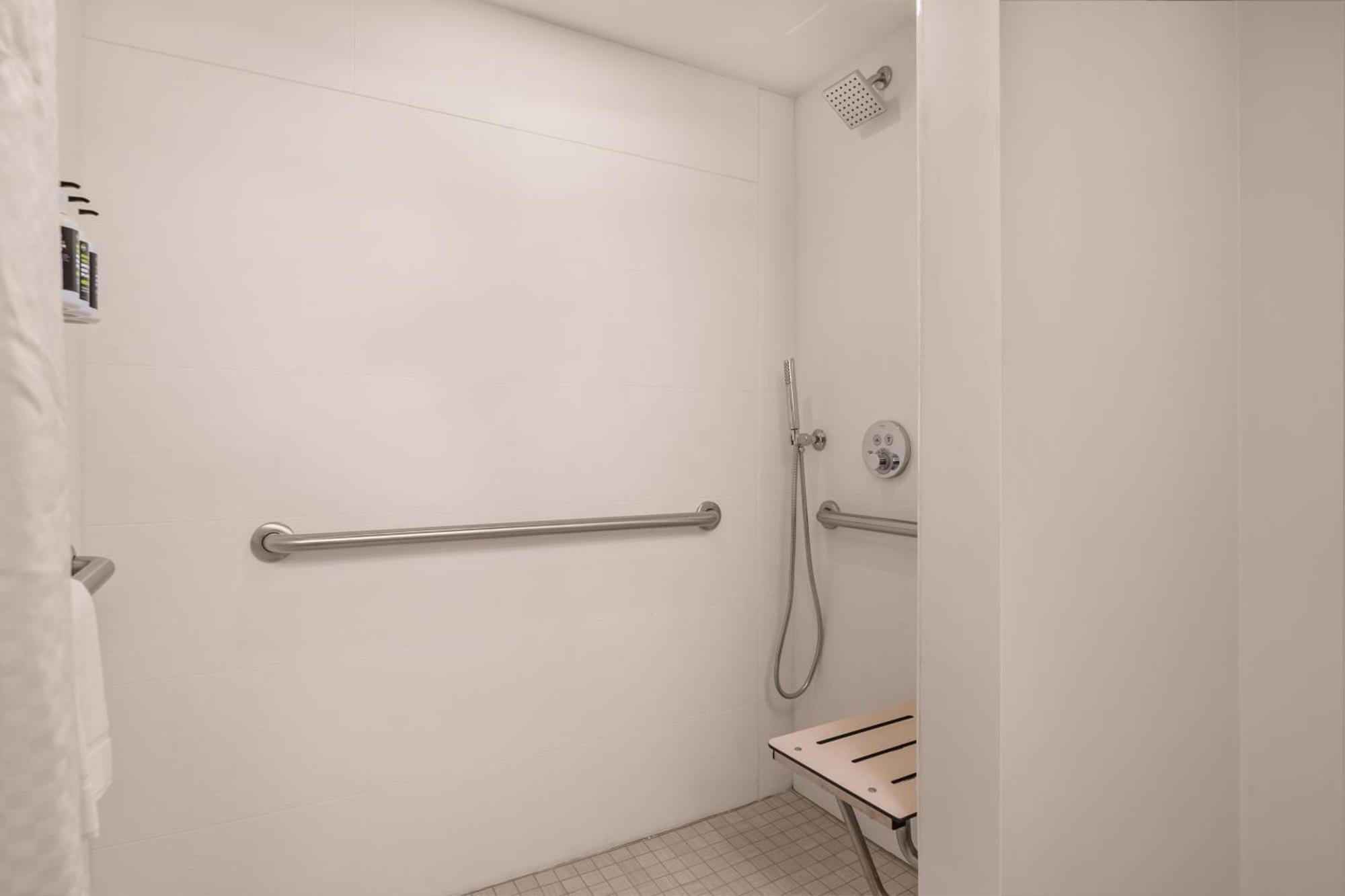 One King Bed Mobility or Hearing Handicap Room Roll Shower Non Smoking