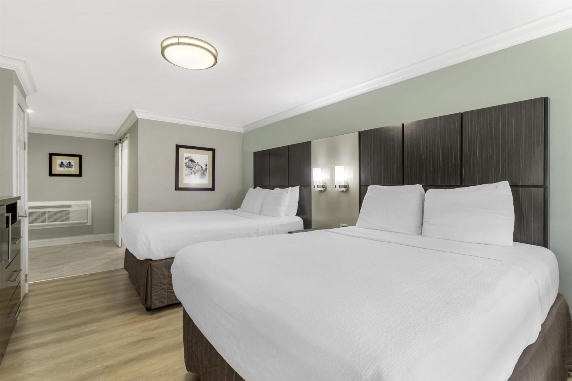 Queen Room Two Queen Beds Roll Shower Disability Access or Non-Smoking