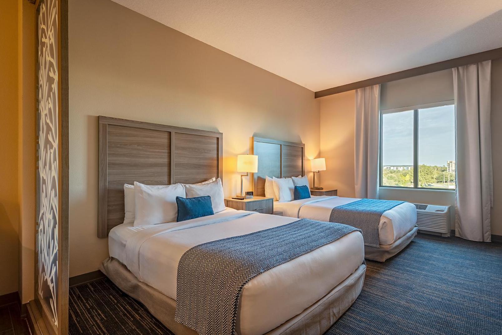 Double Queen Suite ADA (4 Adults + 1 Children)