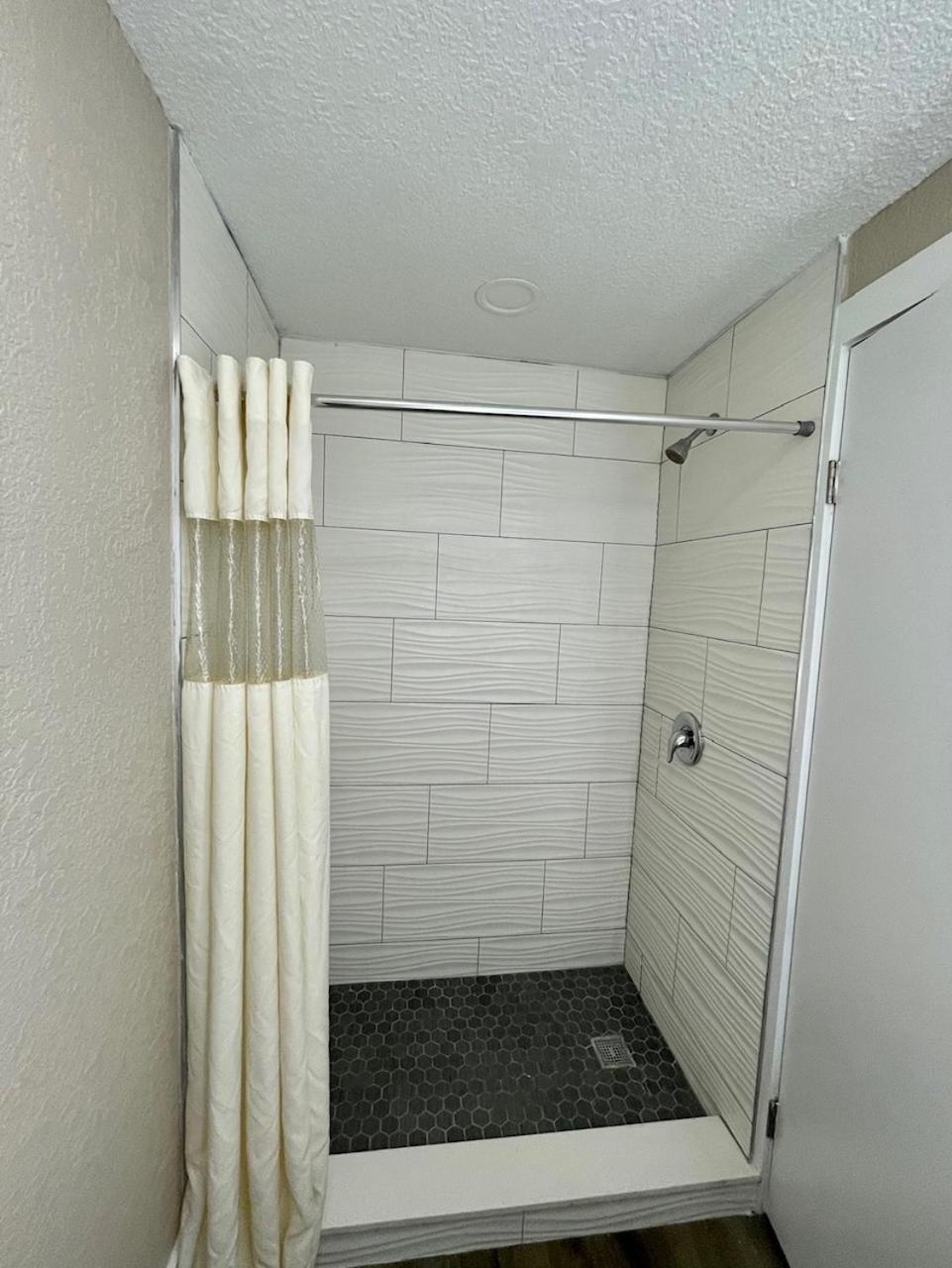 King Room Mobility or Hearing Access Roll Shower Non-Smoking