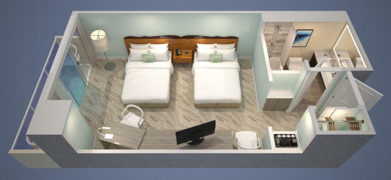 Zimmer mit Queensize-Bett und Poolblick